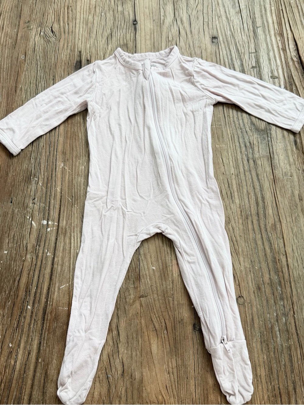 Kyte BABY Soft Pale Pink Footed Zip Onesie